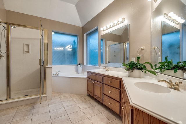 3788 Zion Rd, Garland, TX 75043 - bathroom featuring double vanity, a bath, tile patterned flooring, a stall shower, and a sink