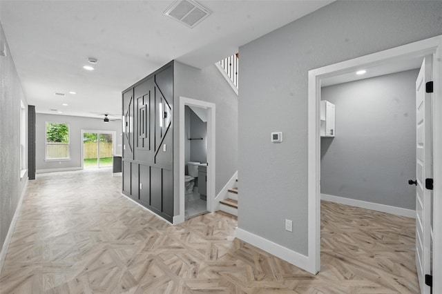 hall featuring stairs, recessed lighting, baseboards, and visible vents