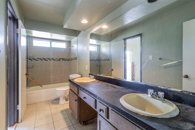 full bathroom featuring tile patterned flooring, a sink, shower / tub combination, and toilet