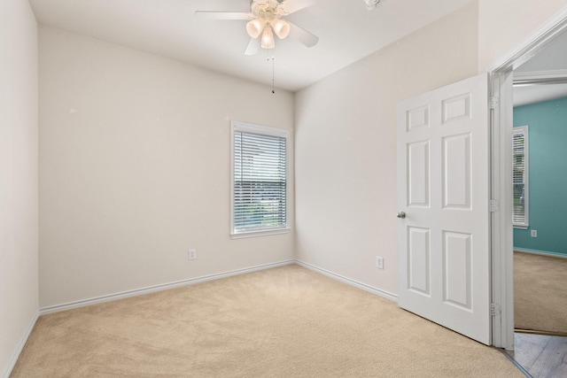 689 Bonham Dr, Lavon, TX 75166 - carpeted spare room with baseboards and a ceiling fan