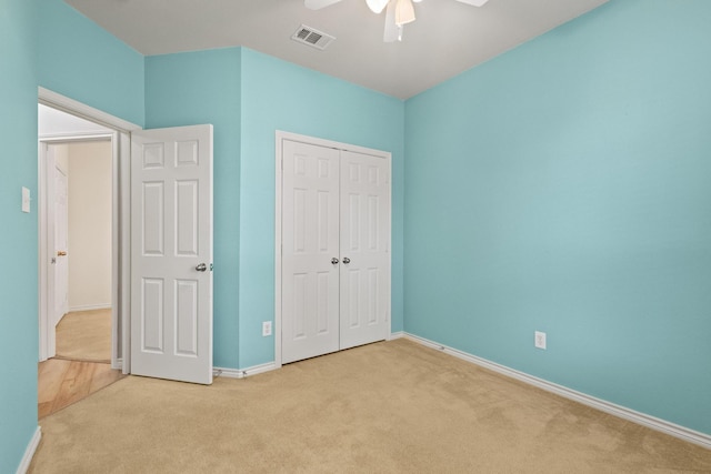 689 Bonham Dr, Lavon, TX 75166 - unfurnished bedroom with a closet, visible vents, baseboards, a ceiling fan, and carpet