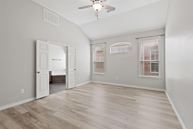 689 Bonham Dr, Lavon, TX 75166 - empty room with visible vents, a ceiling fan, light wood-style flooring, and vaulted ceiling