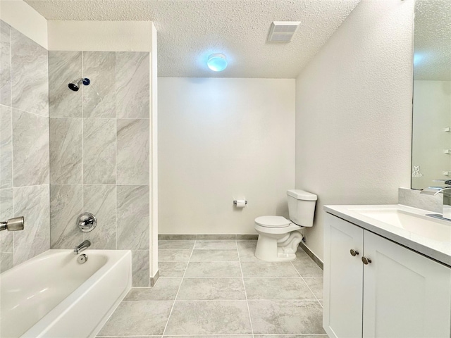 full bathroom featuring visible vents, tile patterned flooring, vanity, toilet, and a textured ceiling