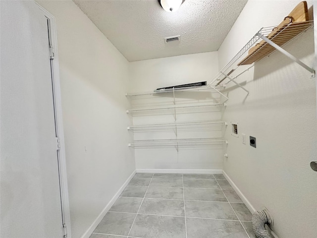 walk in closet with visible vents