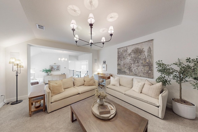 living room featuring light carpet, a chandelier, baseboards, lofted ceiling, and visible vents