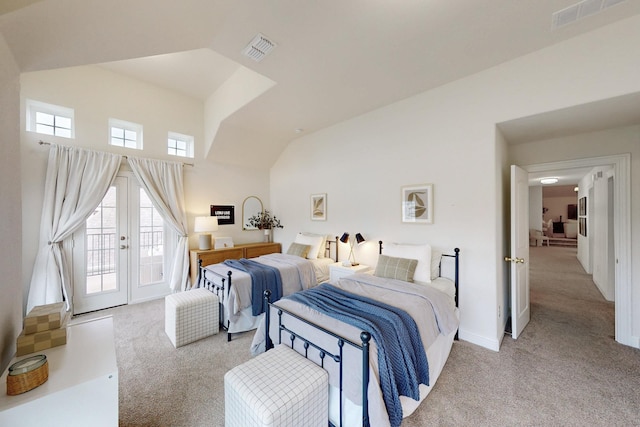 bedroom featuring visible vents, carpet flooring, access to outside, and french doors