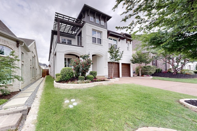 view of front facade with a garage, a front lawn, a balcony, and driveway