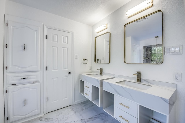 1441 Marlene Pl, Desoto, TX 75115 - bathroom featuring a sink, marble finish floor, walk in shower, and two vanities