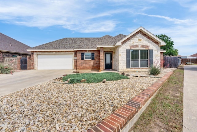 single story home featuring a garage, brick siding, fence, concrete driveway, and a shingled roof