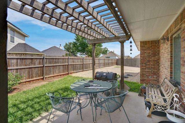 view of patio / terrace with a pergola, outdoor dining area, and a fenced backyard