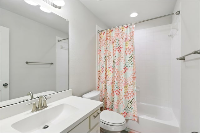 full bathroom with toilet, shower / bath combo, and vanity