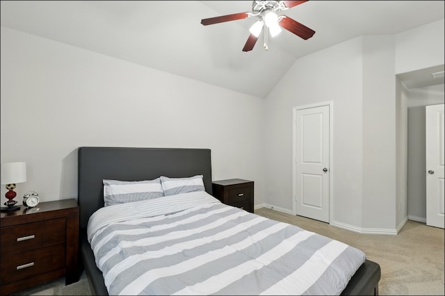 bedroom with carpet floors, baseboards, ceiling fan, and lofted ceiling