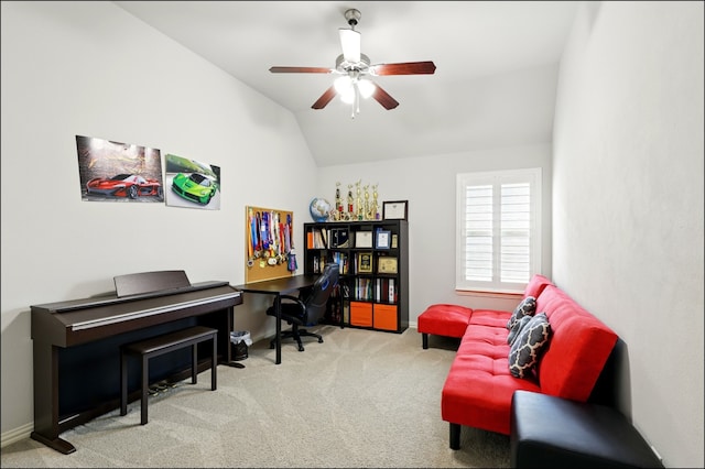home office featuring carpet floors, ceiling fan, baseboards, and lofted ceiling