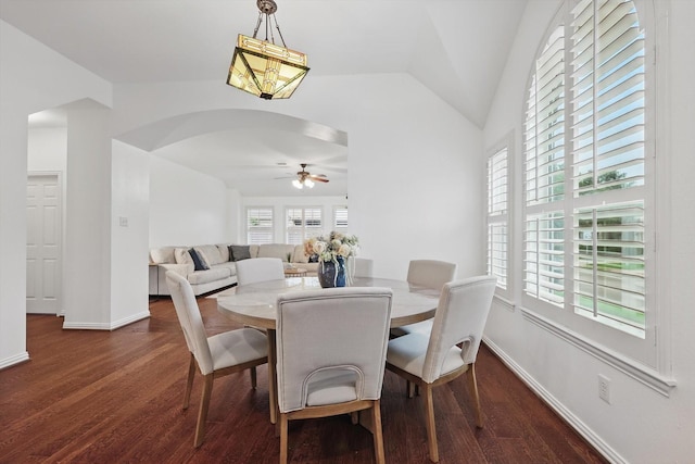 5729 New Castle Dr, Richardson, TX 75082 - dining room with baseboards, ceiling fan, vaulted ceiling, and dark wood finished floors