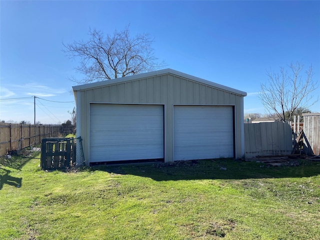 detached garage with fence