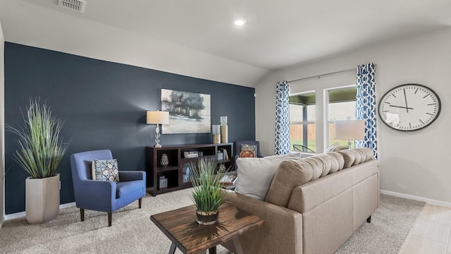 living area with carpet floors, visible vents, lofted ceiling, baseboards, and recessed lighting