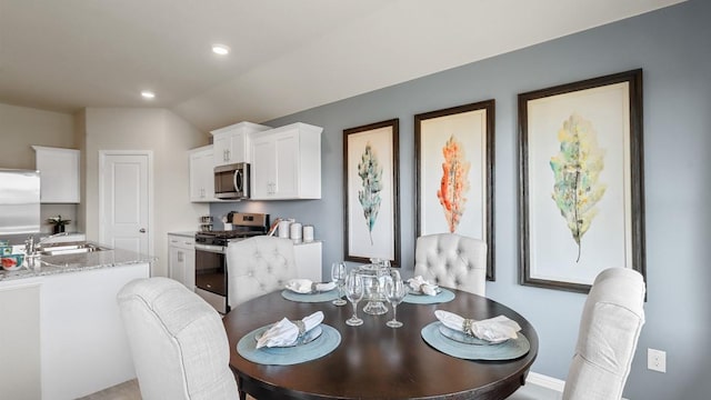 316 Pecos Dr, Azle, TX 76020 - dining area featuring recessed lighting and vaulted ceiling