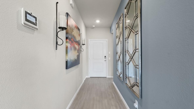 316 Pecos Dr, Azle, TX 76020 - hall featuring baseboards and wood finished floors