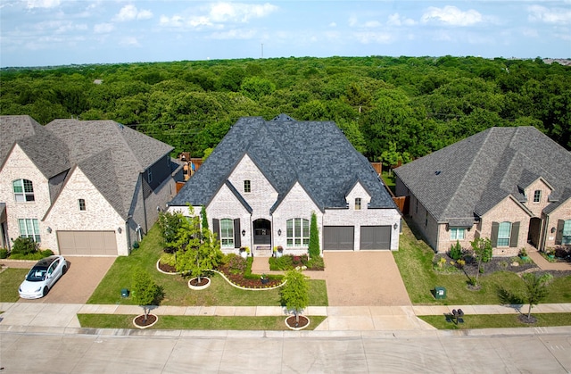aerial view featuring a view of trees