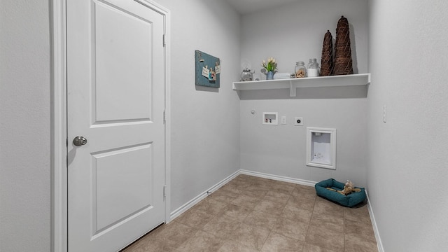clothes washing area with hookup for an electric dryer, hookup for a gas dryer, baseboards, and laundry area