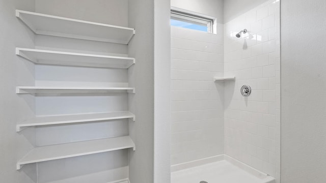 full bath with a shower stall