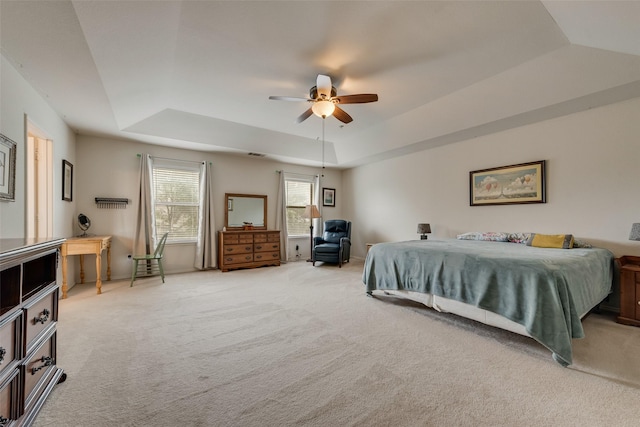 4312 Summer Star Ln, Fort Worth, TX 76244 - bedroom with a tray ceiling, light colored carpet, ceiling fan, and visible vents