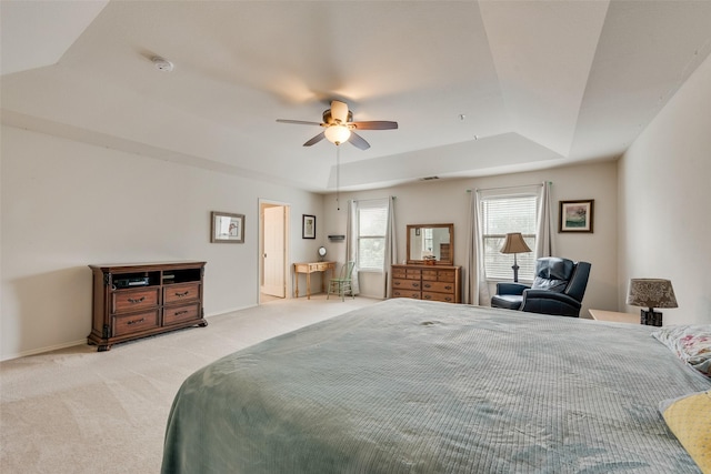 4312 Summer Star Ln, Fort Worth, TX 76244 - bedroom featuring a ceiling fan, baseboards, light carpet, and a tray ceiling