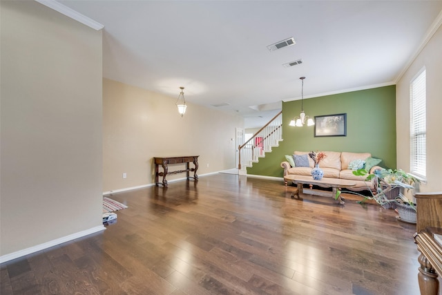 4312 Summer Star Ln, Fort Worth, TX 76244 - living area with visible vents, ornamental molding, wood finished floors, and stairway