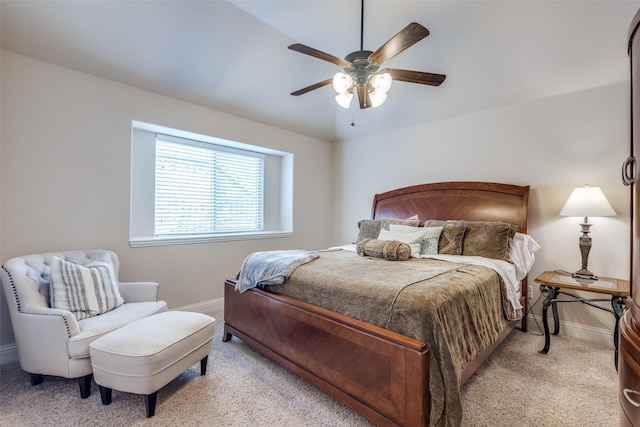 bedroom featuring carpet floors, a ceiling fan, and baseboards