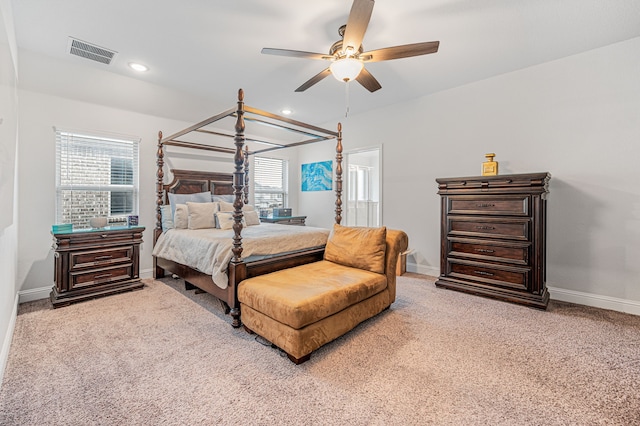 bedroom with carpet flooring, recessed lighting, baseboards, a ceiling fan, and visible vents