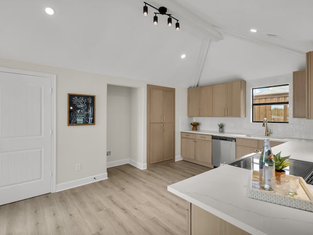 kitchen with stainless steel dishwasher, light brown cabinetry, a sink, and light wood-style flooring