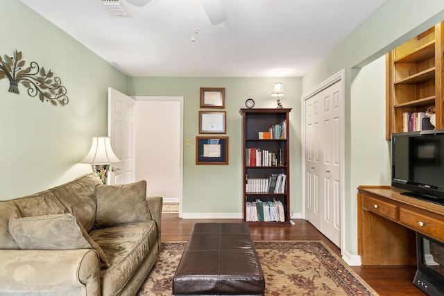 4705 El Salvador Ct, Arlington, TX 76017 - living area with visible vents, dark wood finished floors, ceiling fan, and baseboards