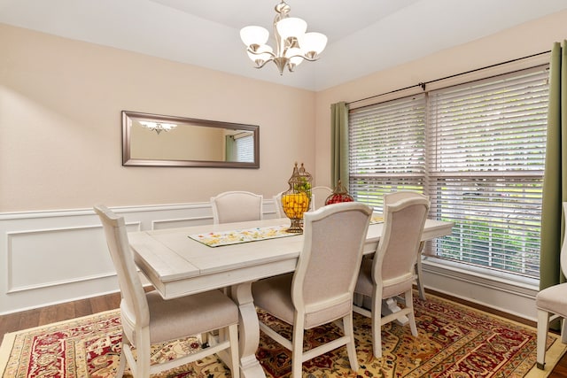 4705 El Salvador Ct, Arlington, TX 76017 - dining area with an inviting chandelier and wood finished floors