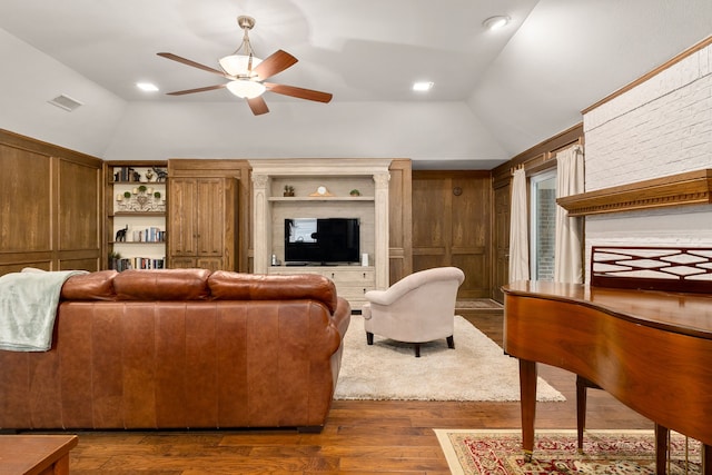 4705 El Salvador Ct, Arlington, TX 76017 - living room featuring visible vents, a ceiling fan, dark wood finished floors, and vaulted ceiling