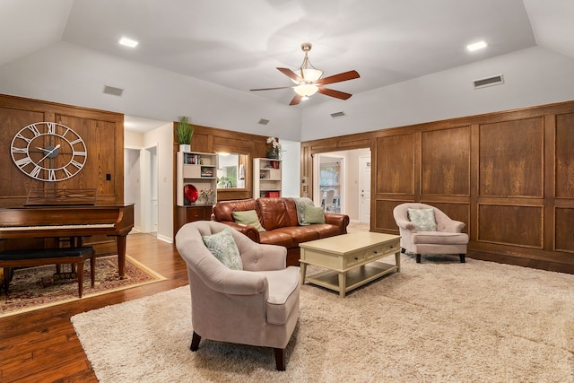 4705 El Salvador Ct, Arlington, TX 76017 - living room with a ceiling fan, vaulted ceiling, wood finished floors, and visible vents