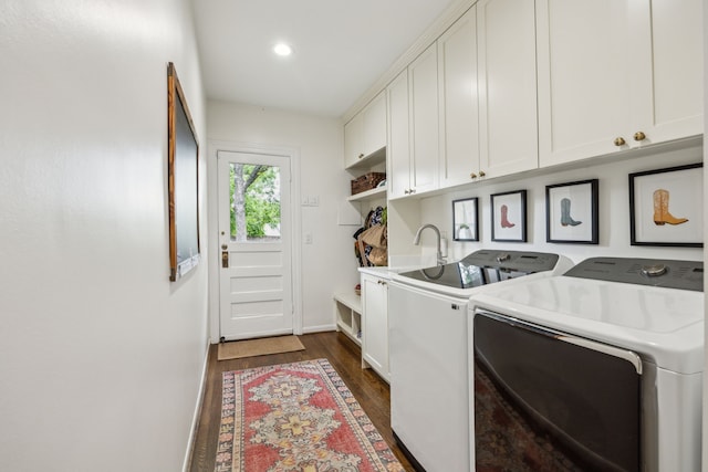 laundry area featuring dark wood-style flooring, cabinet space, baseboards, recessed lighting, and washer and clothes dryer