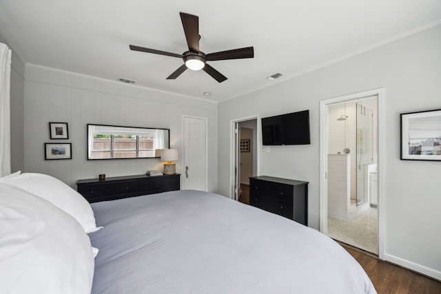 bedroom with visible vents, ornamental molding, dark wood-style flooring, and baseboards