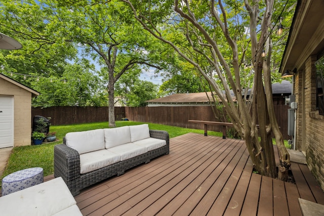 deck with a yard, a fenced backyard, and an outdoor hangout area