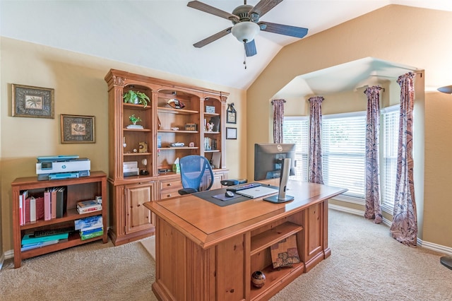 home office with light colored carpet, a ceiling fan, baseboards, and lofted ceiling