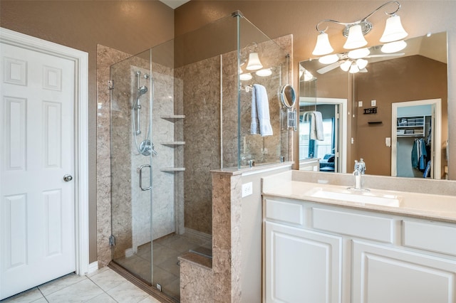 bathroom featuring vanity and a shower stall