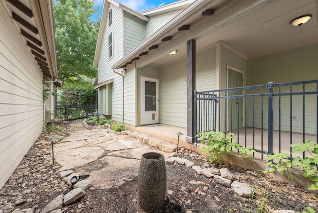 exterior space with a patio area and fence