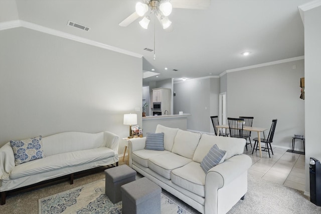 living area featuring crown molding, recessed lighting, ceiling fan, and visible vents