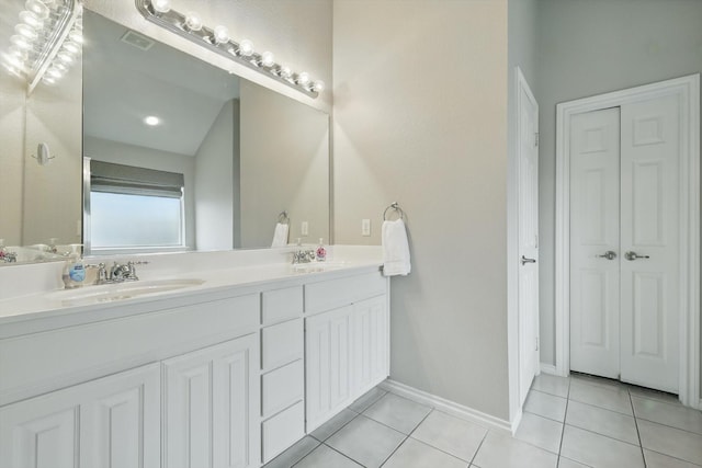4833 Heber Springs Trl, Fort Worth, TX 76244 - bathroom with tile patterned floors, a closet, double vanity, and baseboards