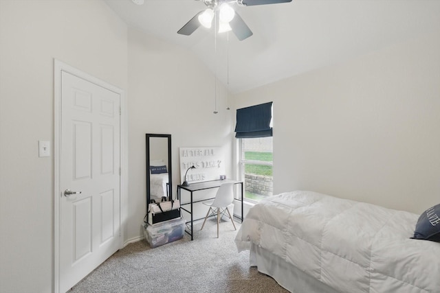 carpeted bedroom featuring high vaulted ceiling and ceiling fan