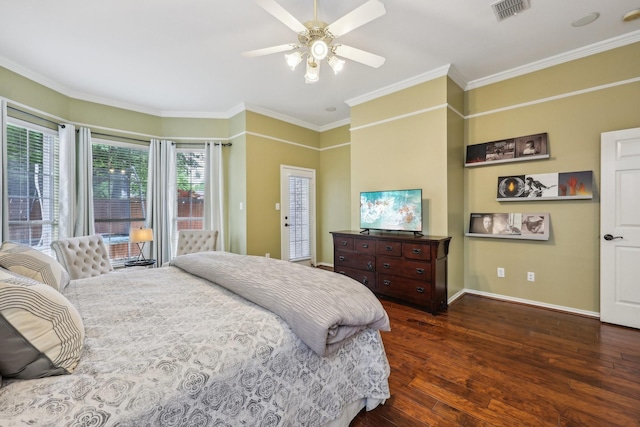 bedroom with ceiling fan, baseboards, wood finished floors, visible vents, and ornamental molding