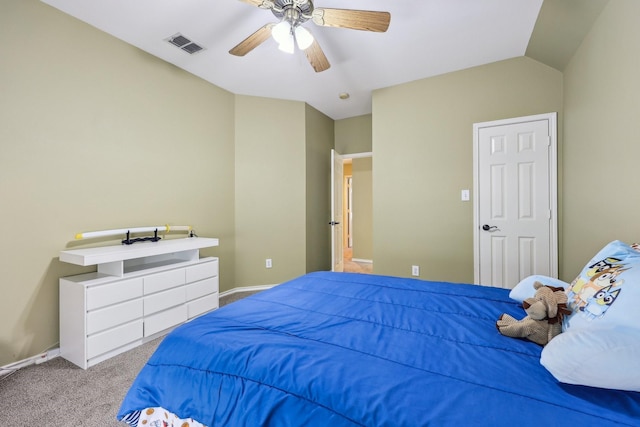 carpeted bedroom featuring visible vents, a ceiling fan, and baseboards