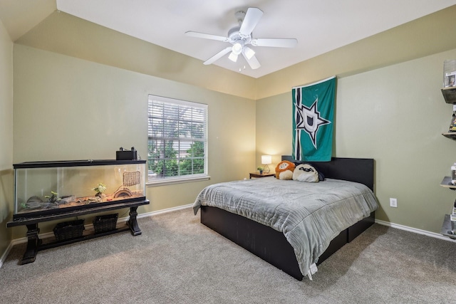 carpeted bedroom with baseboards and ceiling fan
