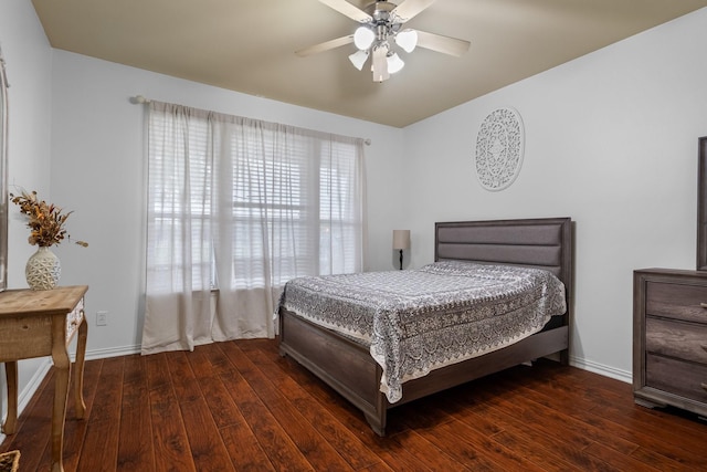 172 High School Dr, Lewisville, TX 75057 - bedroom with baseboards, a ceiling fan, and hardwood / wood-style floors