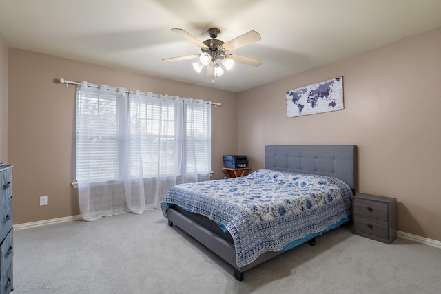 172 High School Dr, Lewisville, TX 75057 - carpeted bedroom with a ceiling fan and baseboards
