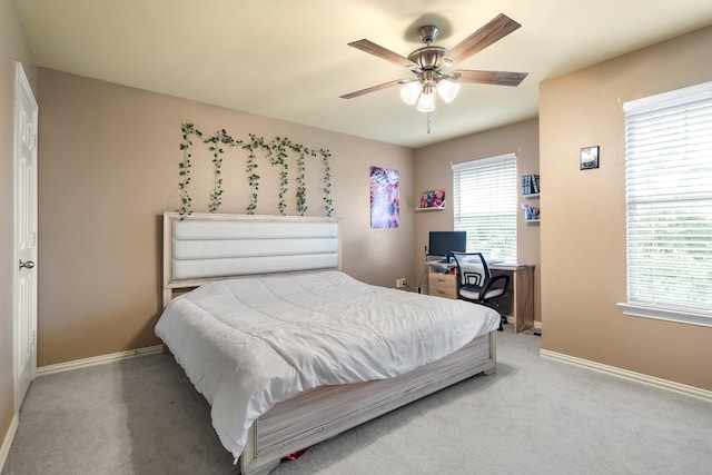 172 High School Dr, Lewisville, TX 75057 - carpeted bedroom featuring baseboards and a ceiling fan